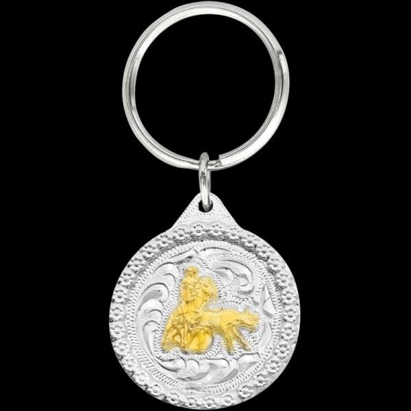 Gold Heeler, Who doesn’t love calf roping?! This keychain includes a beautiful berry border, a calf roping 3D figure, and a key ring attachment. Each silver key c